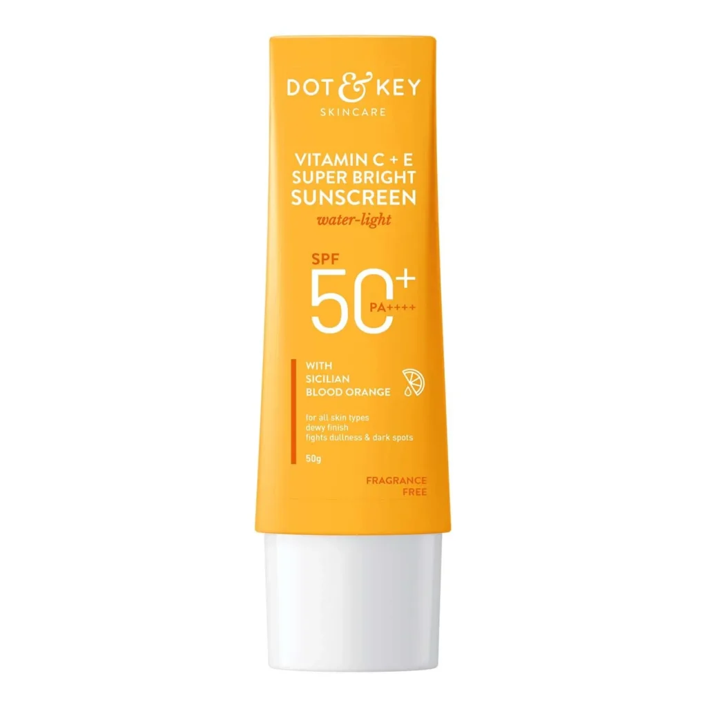 DOT & KEY Vitamin C + E Sunscreen bottle with citrus slices. Description: DOT & KEY