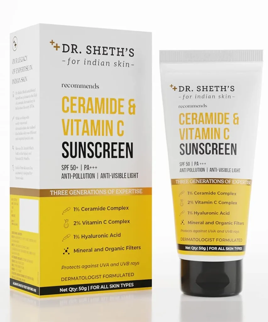 Dr. Sheth's Ceramide & Vitamin C Sunscreen tube placed on a marble surface.