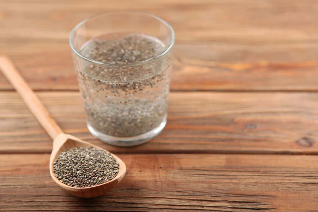 A glass of water with chia seeds