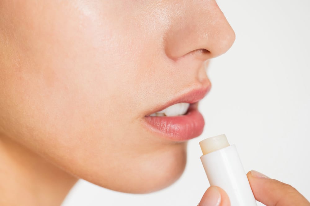 Lip balm application as a base for lipstick